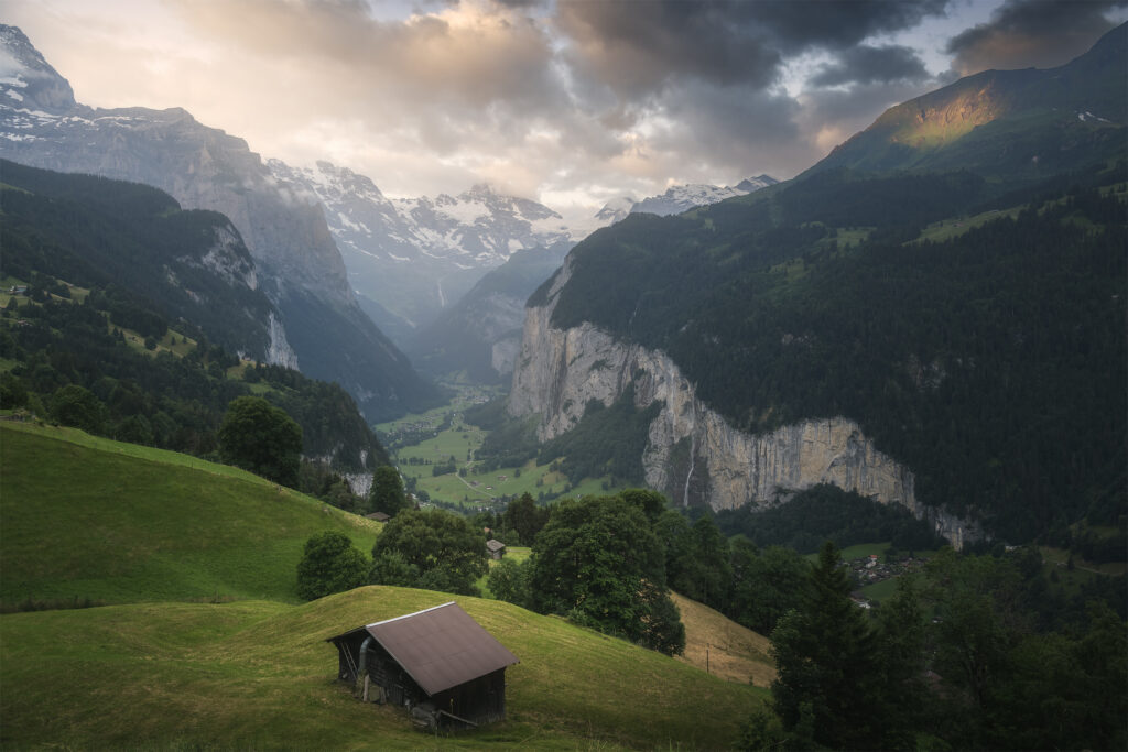 Wooden hut above the Lauterbrunnen valley at sunset, Switzerland