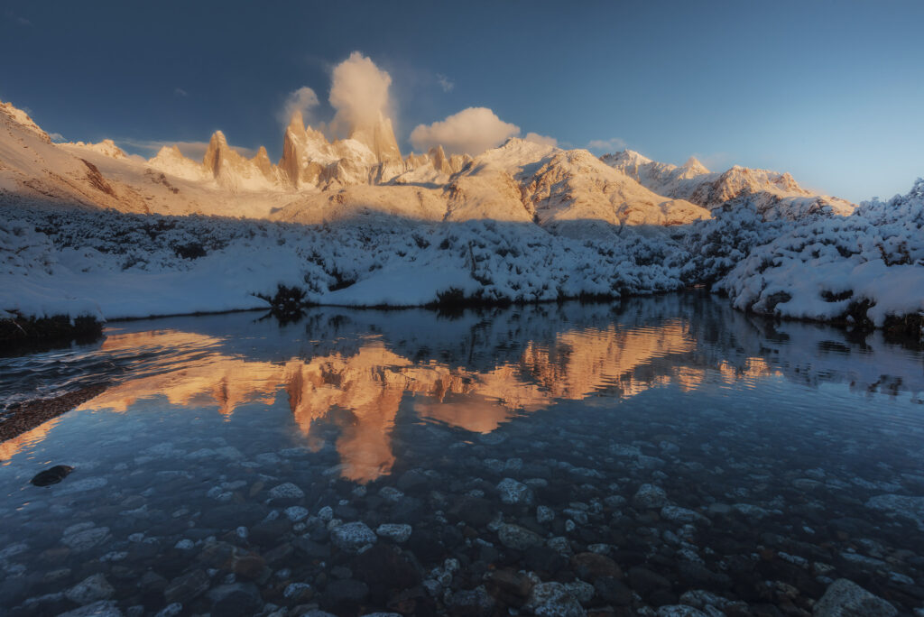 Fitz Roy massif reflected in a lake at sunrise, Patagonia